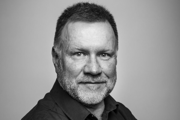 Niels Bjerre-Poulsen, Cand. mag. i historie og amerikanske studier fra Københavns Universitet, ph.d. i amerikansk historie fra University of California, Santa Barbara.